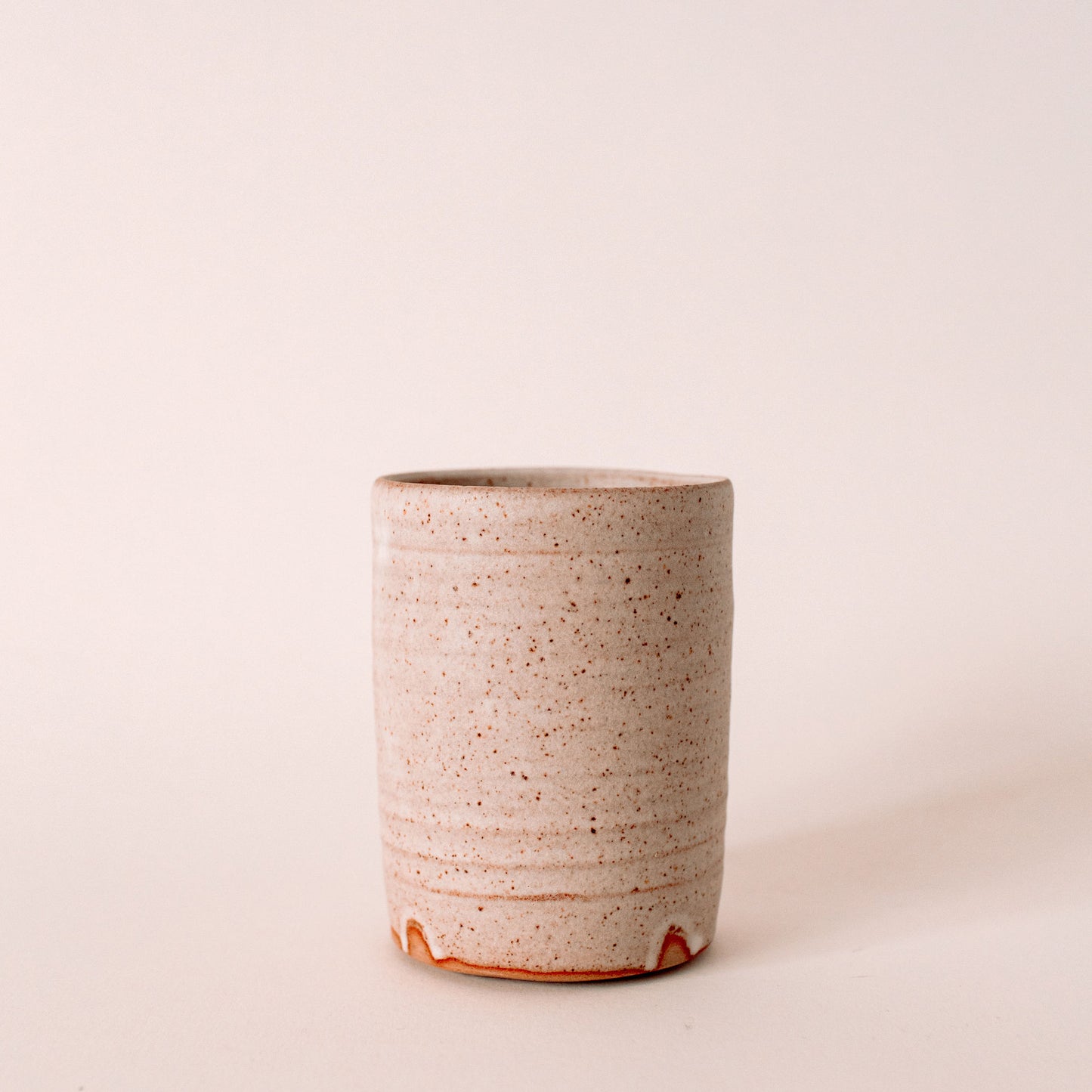 Kneebone ceramic toothbrush holder with small hole for drainage- simple in design. elegant- made in Cornwall. Artisan. Hand made