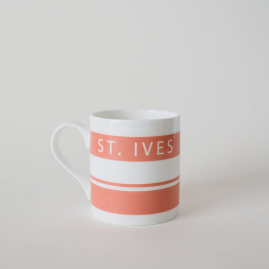 Salmon Pink Cornish stripe Mug with St vet written on one side- Designed in St Ives- Cornwall.