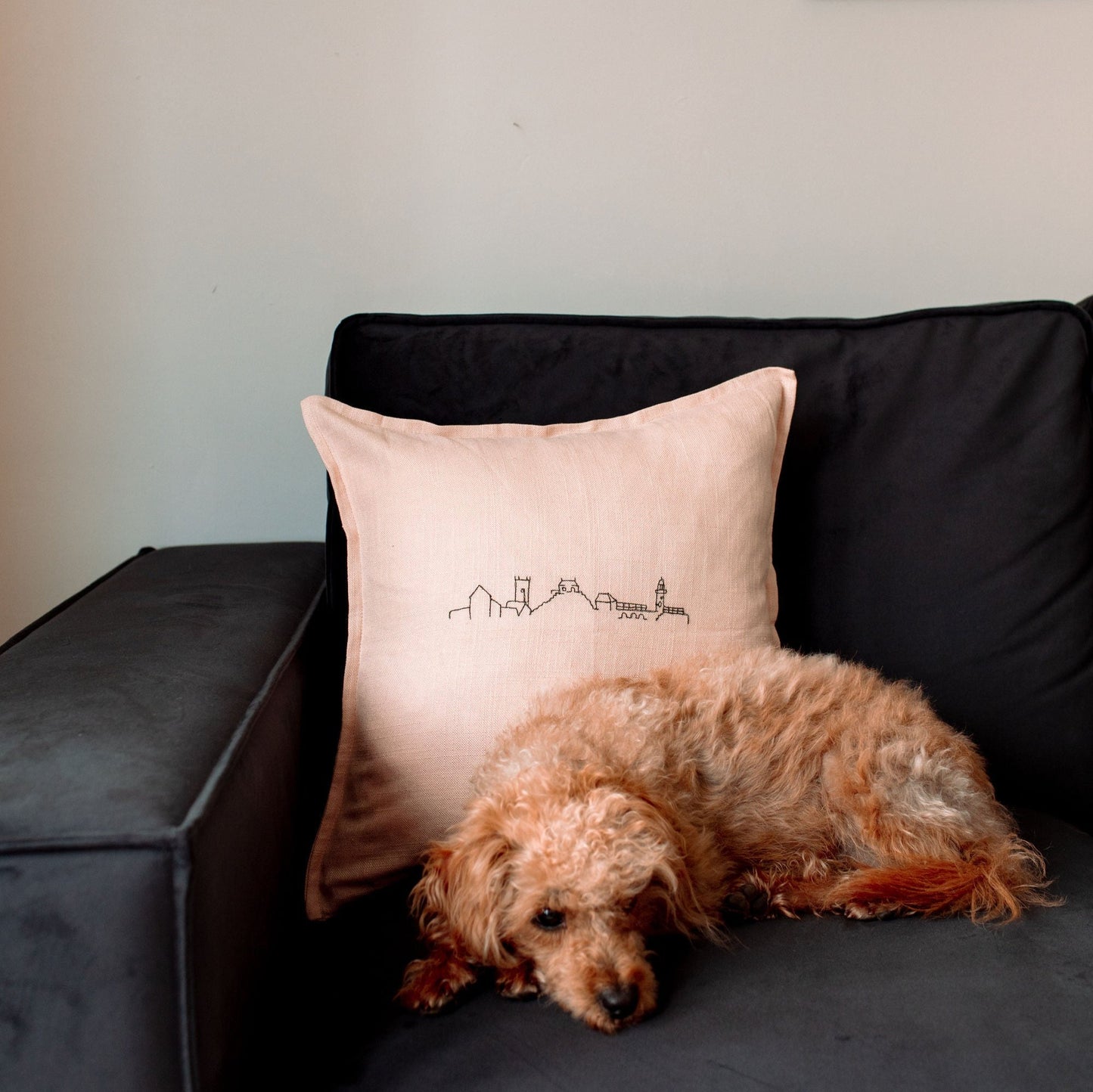 Dusty pink skyline cushion