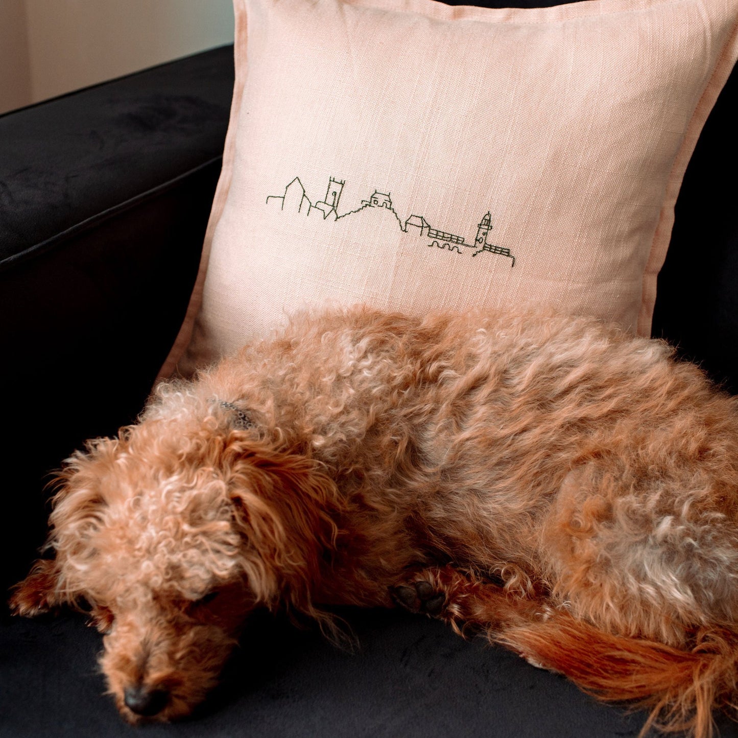 Dusty pink skyline cushion