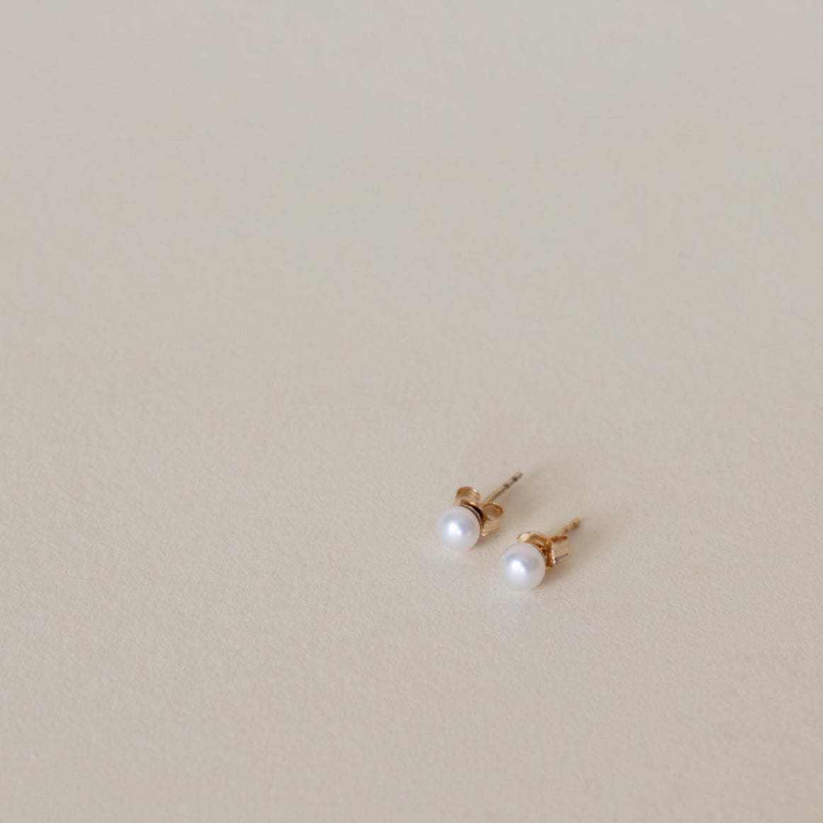 Tiny Pearl Studs