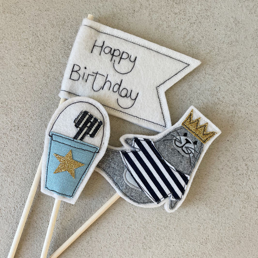Beautiful hand embroidered 'Seal" Cake toppers. Happy Birthday! designed in St Ies. Exclusive. Hand made. Artisan.