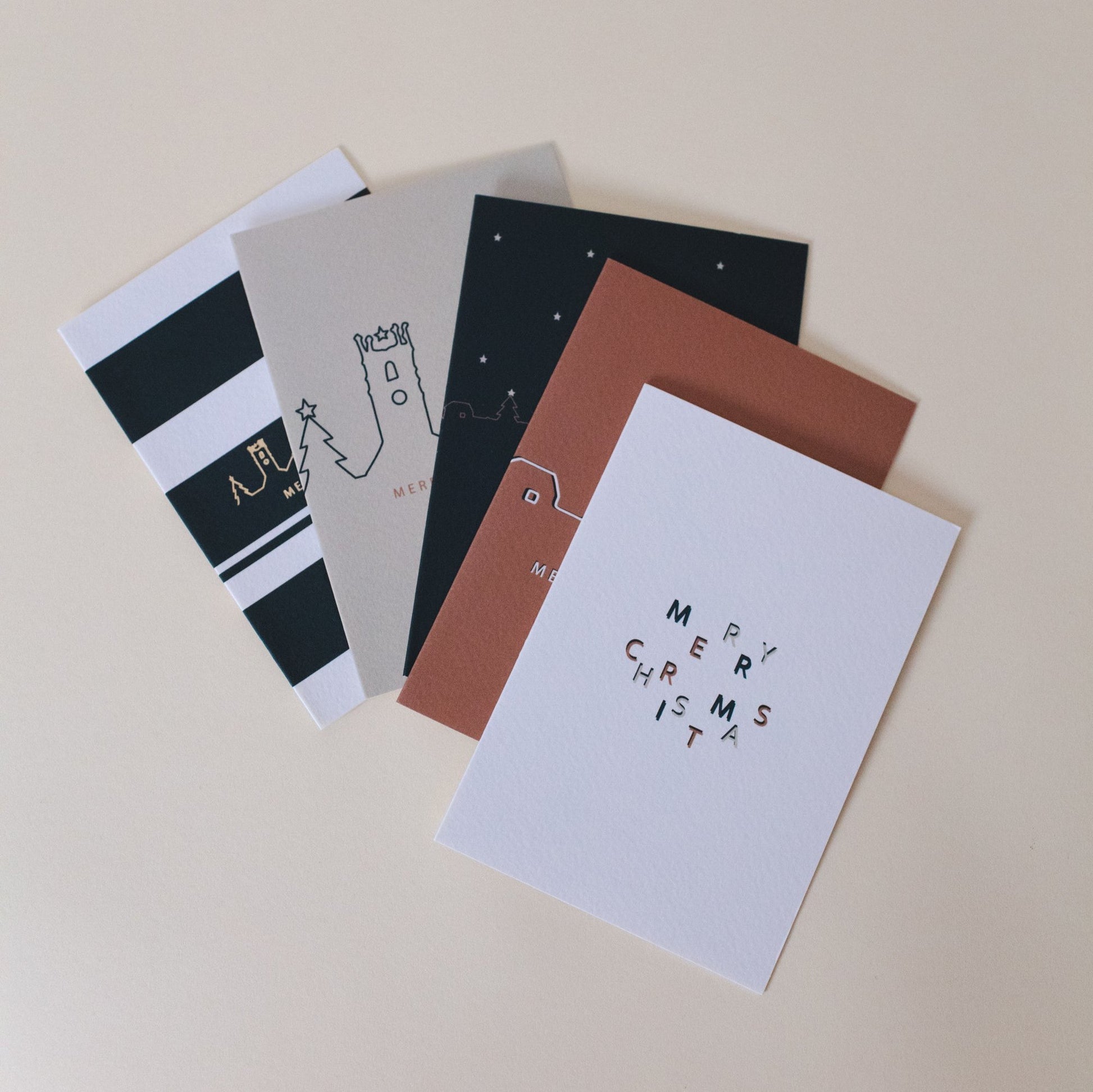 A multipack of 5 portrait Christmas cards inspired by St Ives including the famous St Ives Skyline. blank inside 