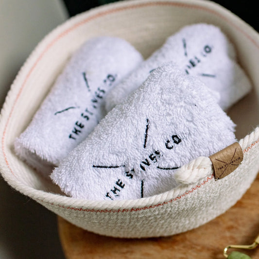 Designed in St Ives singular white cotton facecloth embroidered with 'The St Ives Co' logo- Cornwall, artisan, unique